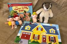 picture of the book with the props for the story 