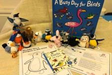 a picture of the book with the finger puppets that accompany the story.