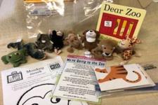 picture of the book with the props for the story 