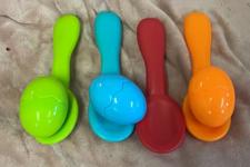 picture of four spoons with eggs