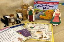 a picture of the book with the finger puppets that accompany the story.