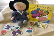 picture of the book with the props for the story 