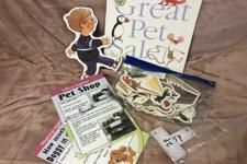 picture of the book with the props for the story