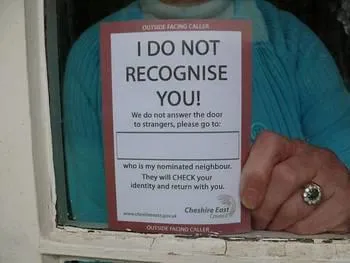 resident at window with card
