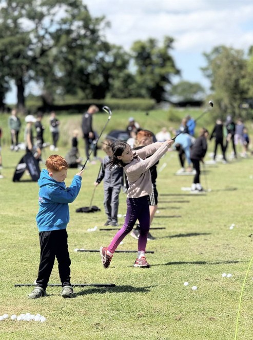 Children playing golf