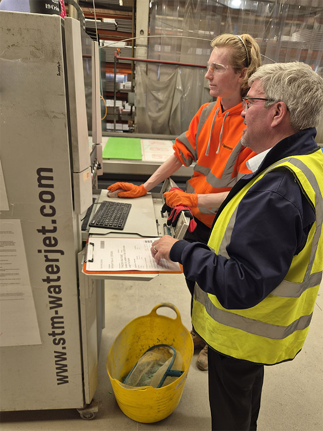 Image of Councillor Nick Mannion with Thermmark employee