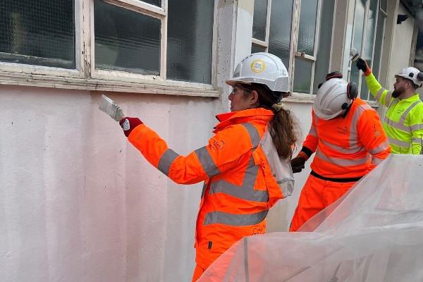 Volunteers carrying out some painting