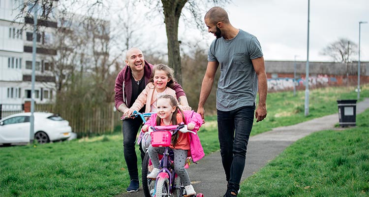 Family out walking with children.