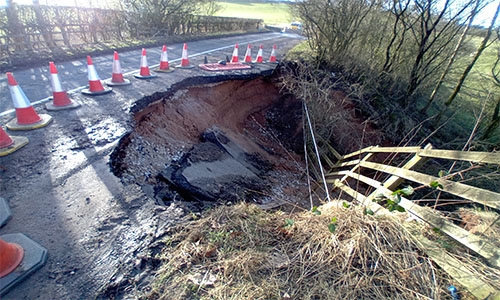 Image of collapsed Rainow Road