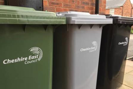 Three wheelie bins