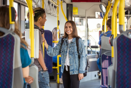 Children catch the bus to school