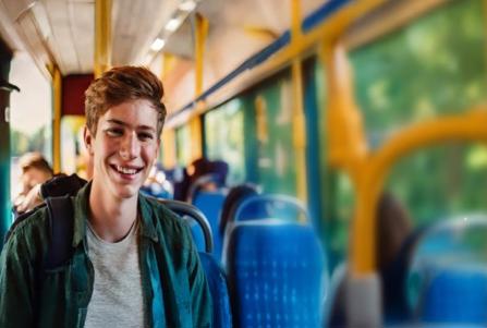 Young student on a bus