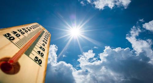 thermometer showing rising temperatures in the sunshine