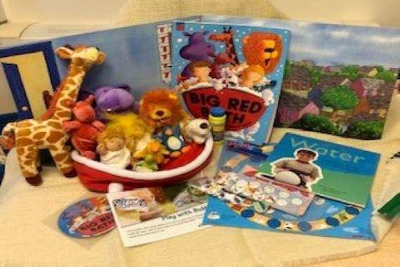 picture of the book with the props for the story