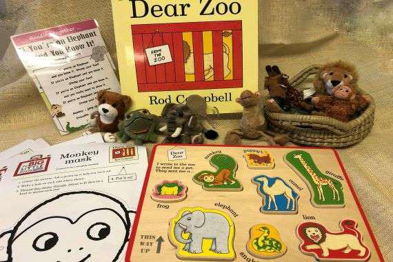 picture of the book with the props for the story 