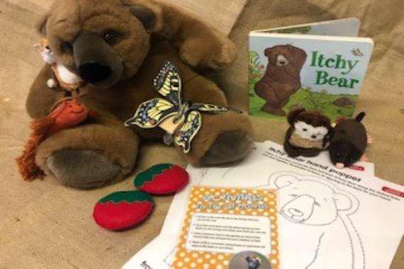 picture of the book with the props for the story