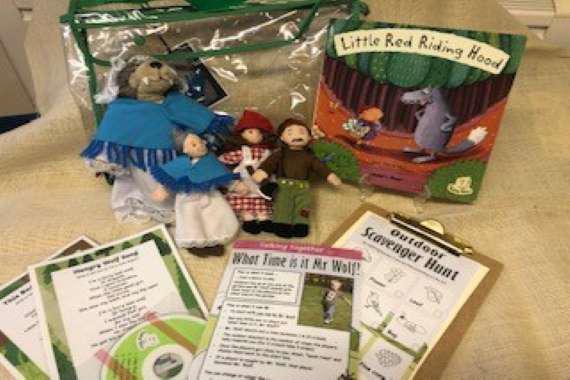 picture of the book with the props for the story 