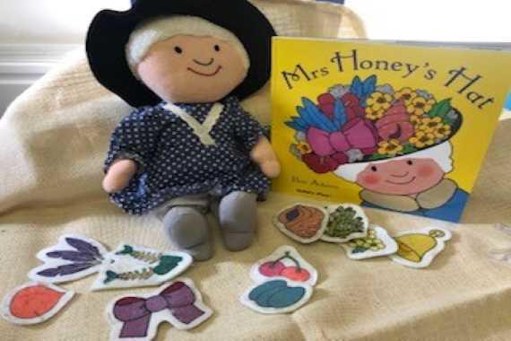 picture of the book with the props for the story 