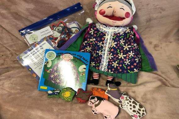 picture of the book with the props for the story 