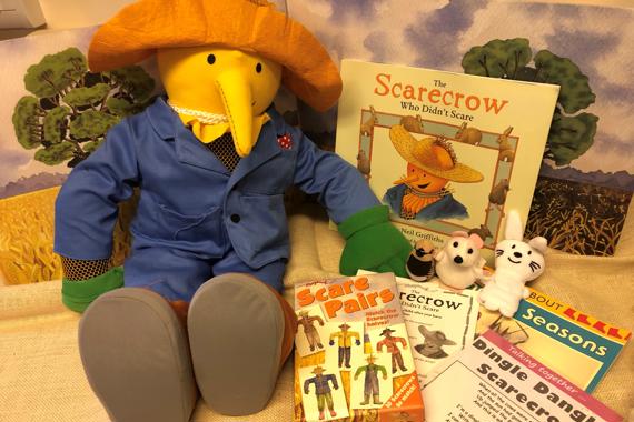 picture of the book with the props for the story