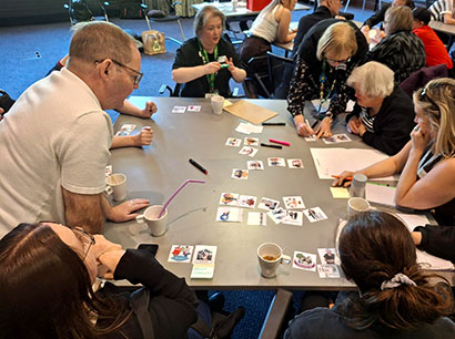 Attendees at the Self-Advocates and Carers meeting 23rd April 2026 sitting around a table
