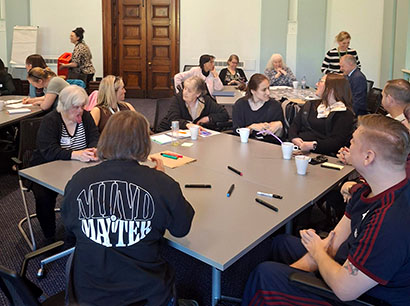 Attendees at the Self-Advocates and Carers meeting 23rd April 2026 - meeting around a table