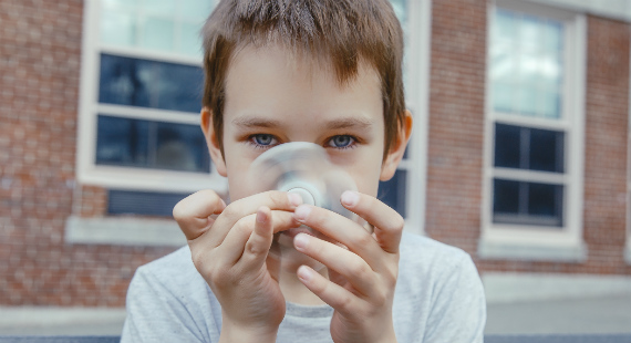 Boy with fidget spinner