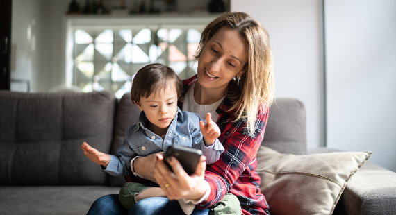 Parent looking at mobile phone