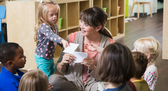 Teacher with a group of primary school children