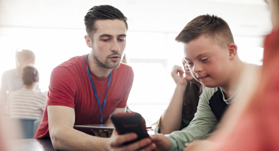 A child with special educational needs and their carer