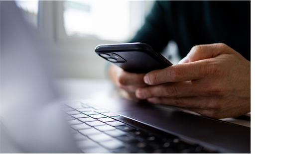A mobile phone being used in the office