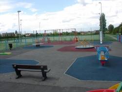 swings and benches at McLaren street play area in Crewe