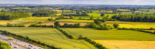 Fields and a motorway